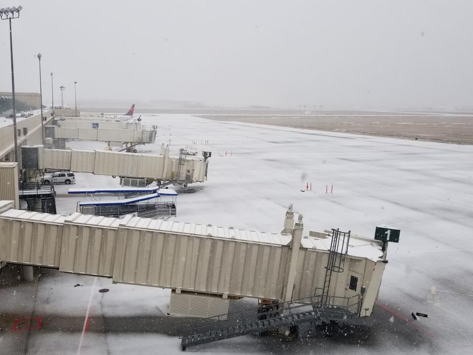 Snow and ice from Winter Storm Grayson blankets the runway at Savannah/Hilton Head International Airport in Jan. 2018. The storm forced the closure of the runways for about 30 hours between Wednesday and Thursday.