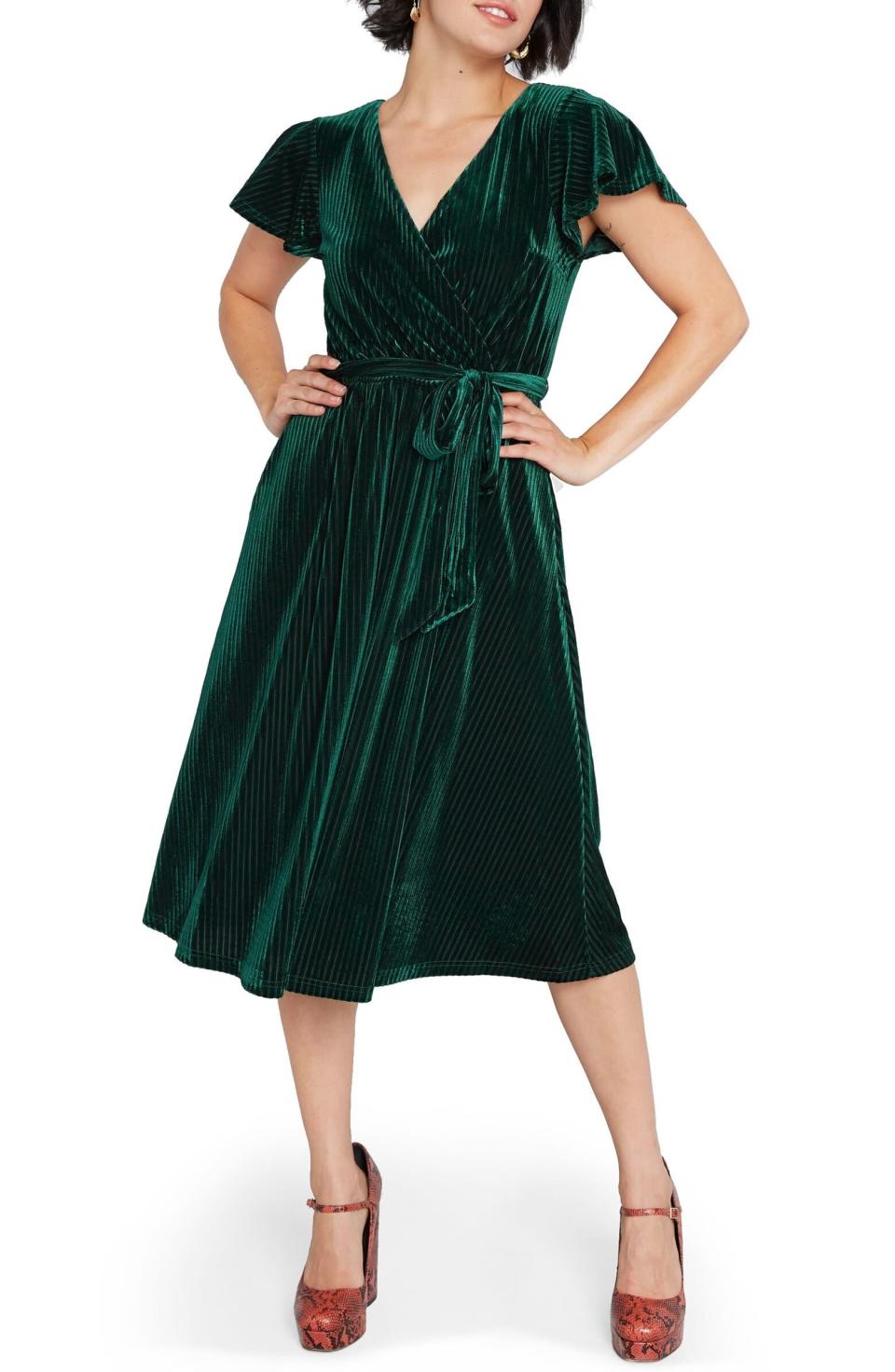 <i>Get the <a href="https://shop.nordstrom.com/s/modcloth-faux-wrap-velvet-dress-regular-plus-size/5336511/full" target="_blank" rel="noopener noreferrer">Modcloth Faux Wrap Velvet Dress</a> for $99.&nbsp;</i>
