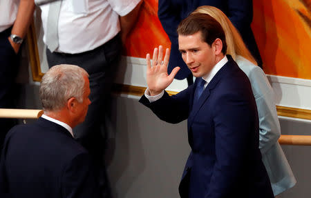 Austrian Chancellor Sebastian Kurz waves as he leaves a session of the Parliament in Vienna, Austria May 27, 2019. REUTERS/Leonhard Foeger