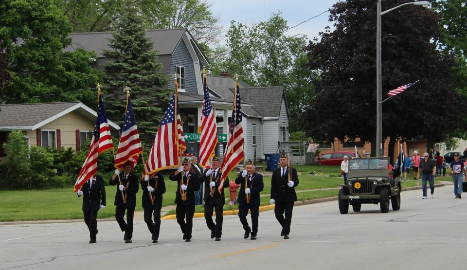 Eugene "Jack" Kraszewski of Pittsfield takes part in a one-man parade on Tuesday, May 28, 2024, in Pulaski. Kraszewski, who turned 100 years old last month, is heading to Normandy, France, for the 80th anniversary of D-Day on June 6, 2024.