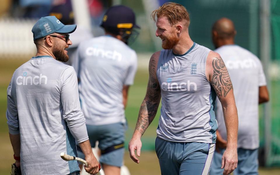 England's Ben Stokes with head coach Brendon McCullum during a nets session at Lord's Cricket Ground, London - PA