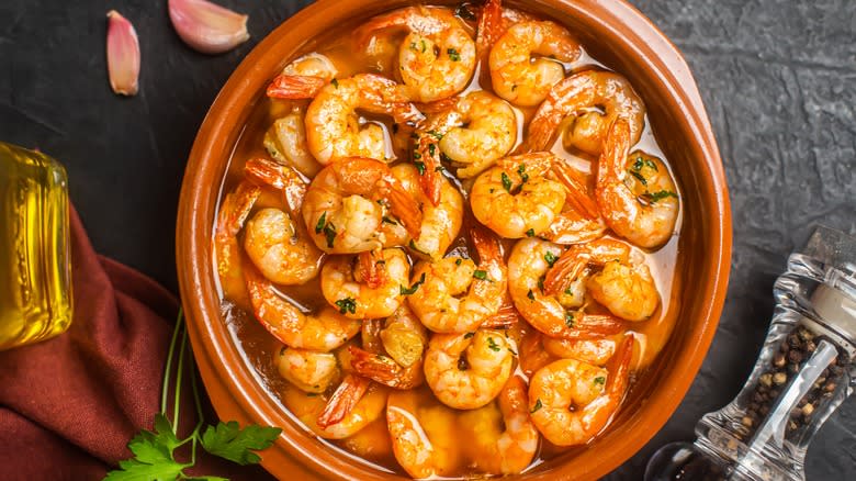 garlic shrimp in terracotta dish