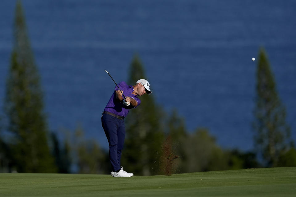 Brian Harman hits form the fourth fairway during the first round of The Sentry golf event, Thursday, Jan. 4, 2024, at Kapalua Plantation Course in Kapalua, Hawaii. (AP Photo/Matt York)