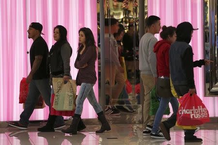 Black Friday shoppers walk inside the Glendale Galleria in Glendale, California November 29, 2013. REUTERS/Jonathan Alcorn