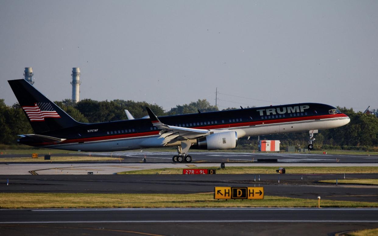 The Republican nominee's plane lands