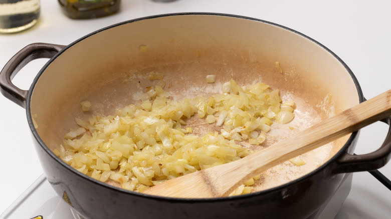 sauteing onions in a pan
