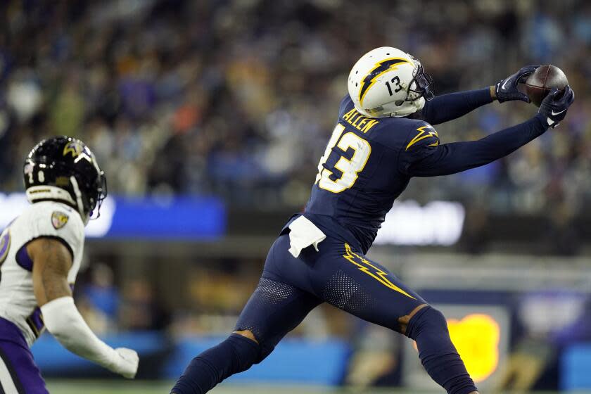 Chargers wide receiver Keenan Allen (13) makes one of his 14 catches against the Ravens.