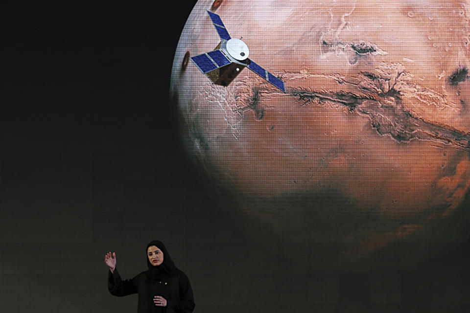 FILE - In this Wednesday, May 6, 2015 file photo, Sarah Amiri, deputy project manager of a planned United Arab Emirates Mars mission talks about the project named "Hope," "Amal" in Arabic, during a ceremony in Dubai, United Arab Emirates. (AP Photo/Kamran Jebreili)