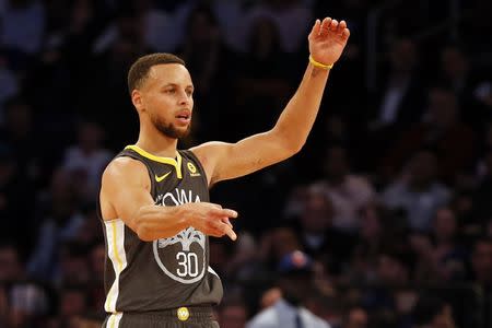 Feb 26, 2018; New York, NY, USA; Golden State Warriors guard Stephen Curry (30) reacts after making a three-point basket and being fouled against the New York Knicks during the second half at Madison Square Garden. Mandatory Credit: Adam Hunger-USA TODAY Sports