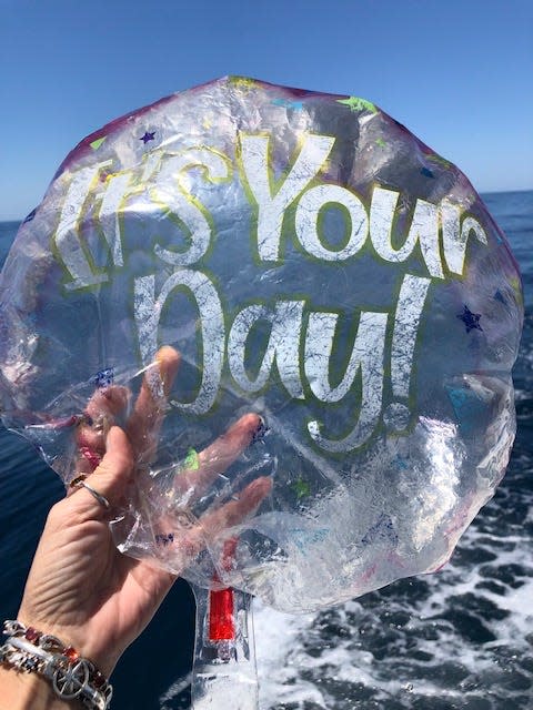 A community member sent a picture of a balloon found 16 miles offshore in the ocean to Nicole Crosby, representative of the St. Johns County Soil & Water Conservation District. Crosby started a petition which ultimately succeeded in banning balloon and lantern releases in St. Johns County early in 2022.
