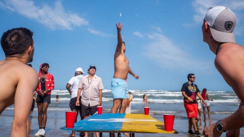 College students in Texas play beer pong.