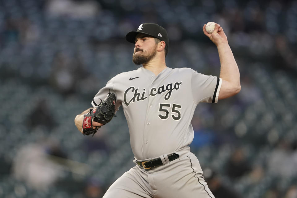 Chicago White Sox starting pitcher Carlos Rodon throws against the Seattle Mariners during the first inning of a baseball game, Monday, April 5, 2021, in Seattle. (AP Photo/Ted S. Warren)