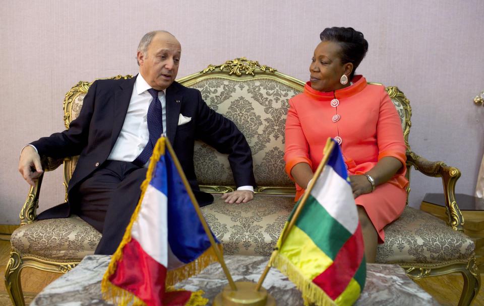 Interim President Samba-Panza sits with France's Foreign Minister Fabius in Bangui