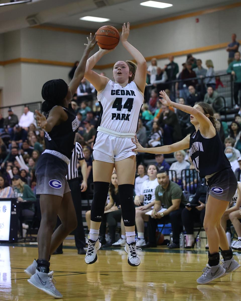 Shelby Hayes fires the jumper for Cedar Park against Georgetown in the district finale Tuesday at Cedar Park High School. Hayes had 17 points and 15 rebounds while leading the unbeaten Timberwolves to a 50-24 victory.