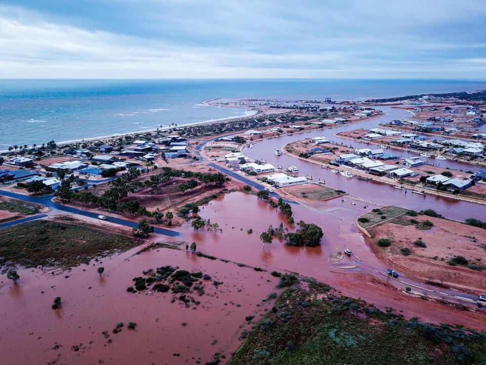 Floodwaters take over Exmouth after an unusually heavy downpour.