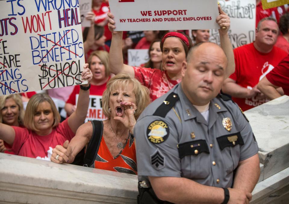 Kentucky State trooper Jeff McWhorter kept his cool while a group of teachers around him were losing theirs. McWhorter was assigned to keep protesting teachers at the foot of the steps leading to the House of Representatives at the Capitol building in Frankfort. April 13, 2018