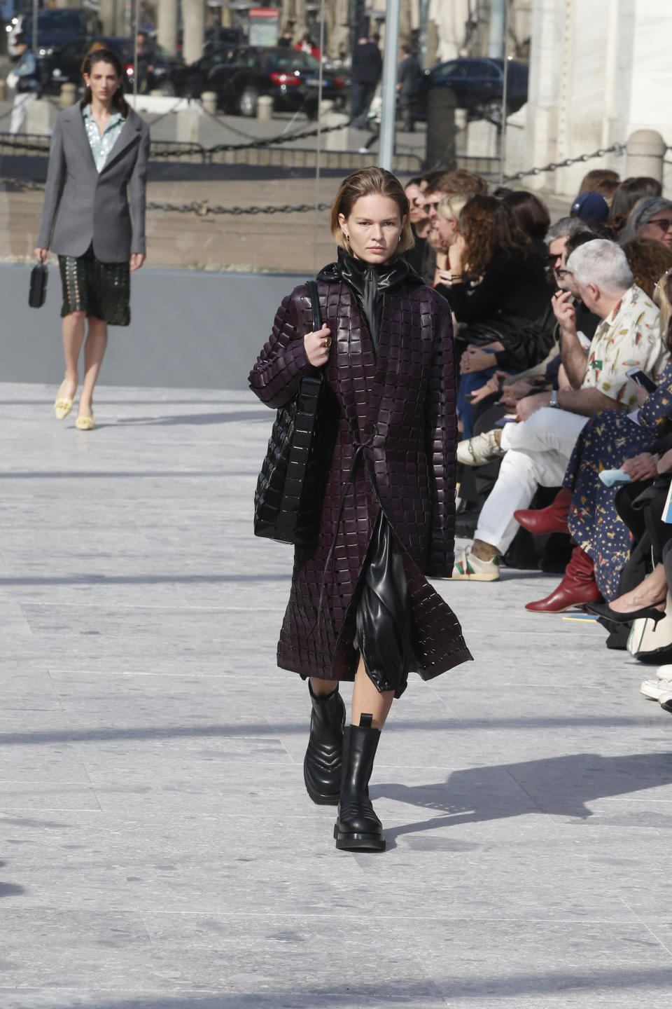 A model wears a creation as part of the Bottega Veneta women's Fall-Winter 2019-2020 collection, that was presented in Milan, Italy, Thursday, Friday, Feb. 22, 2019. (AP Photo/Antonio Calanni)