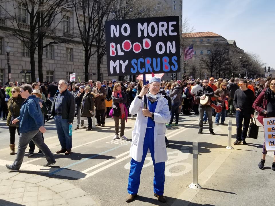 Dr. Tyr Wilbanks holds a sign at the March for Our Lives in Washington, D.C. (Christopher Wilson/Yahoo News)