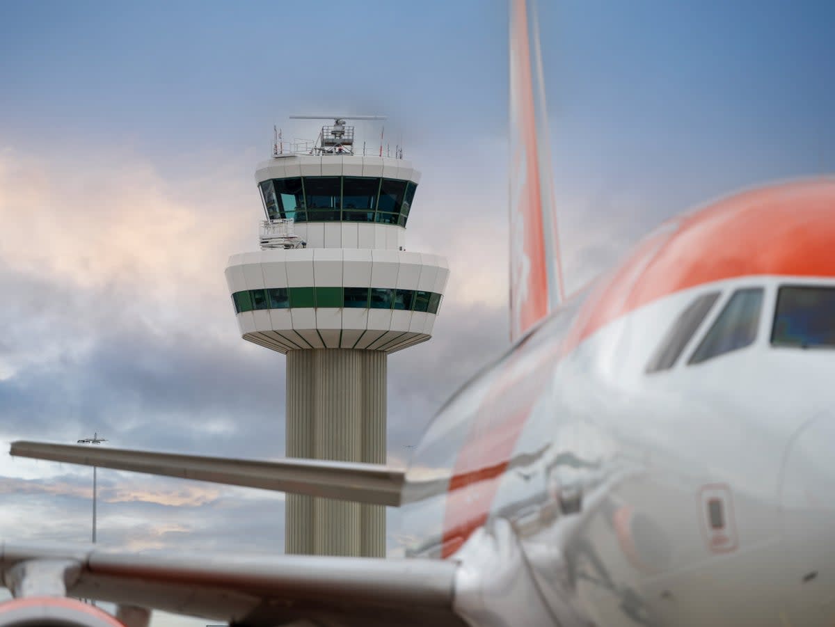 Going places? An easyJet Airbus passes Gatwick airport control tower (Nats)
