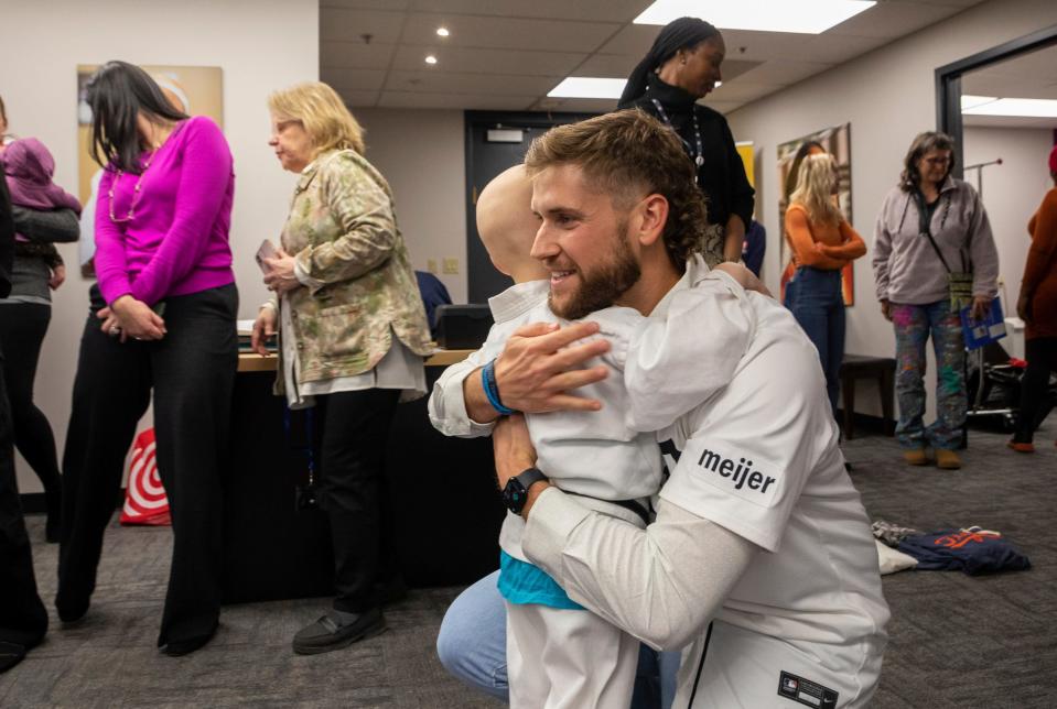 Tigers pitcher Sawyer Gipson-Long hugs 5-year-old Cailen Vela during a Kids Kicking Cancer class inside The Charach Global Kids Kicking Cancer Center in Southfield on Wednesday, Dec. 6, 2023. Gipson-Long met Vela on the mound at Comerica Park just moments before his MLB debut last season.