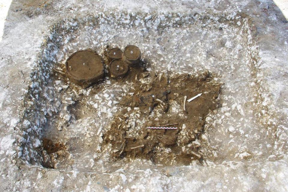 A Neolithic necropolis, including cremated burials, was unearthed, experts said.