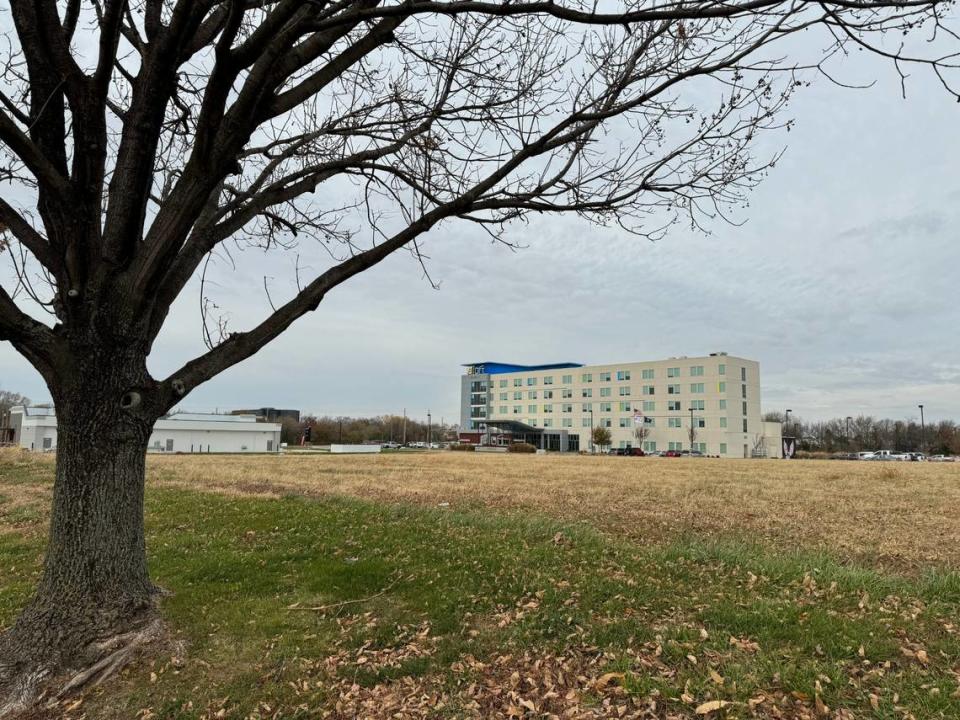 A large empty field at District 96, a new development at K-96 and Oliver, is the future home of TapNPaddles, a new pickleball facility that will also feature a bar and restaurant.