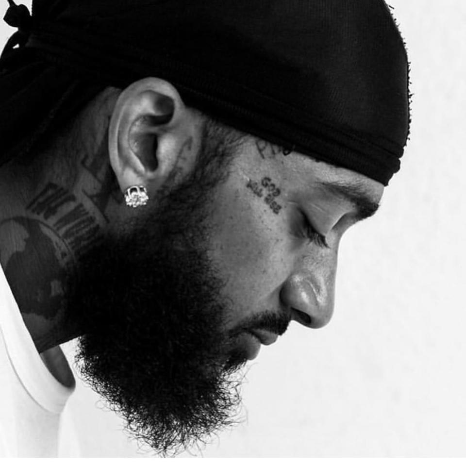 <p>Nipsey Hussle‘s death has shaken the hip-hop community to its core and tributes are continuing to pour in from star’s closest friends. It’s been nearly three days since his senseless slaying and prominent A-listers are still reeling his untimely death. Stars like Ashanti, T.I., Ice Cube and Future took time to gather their thoughts before sharing […]</p> <p>The post <a rel="nofollow noopener" href="https://theblast.com/nipsey-hussle-celebrity-reactions-tributes/" target="_blank" data-ylk="slk:Nipsey Hussle Tributes Continue to Pour in from Celebrity Friends Following Death;elm:context_link;itc:0;sec:content-canvas" class="link ">Nipsey Hussle Tributes Continue to Pour in from Celebrity Friends Following Death</a> appeared first on <a rel="nofollow noopener" href="https://theblast.com" target="_blank" data-ylk="slk:The Blast;elm:context_link;itc:0;sec:content-canvas" class="link ">The Blast</a>.</p>