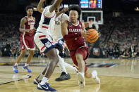 Alabama guard Mark Sears (1) drives against UConn during the second half of the NCAA college basketball game at the Final Four, Saturday, April 6, 2024, in Glendale, Ariz. (AP Photo/Brynn Anderson )