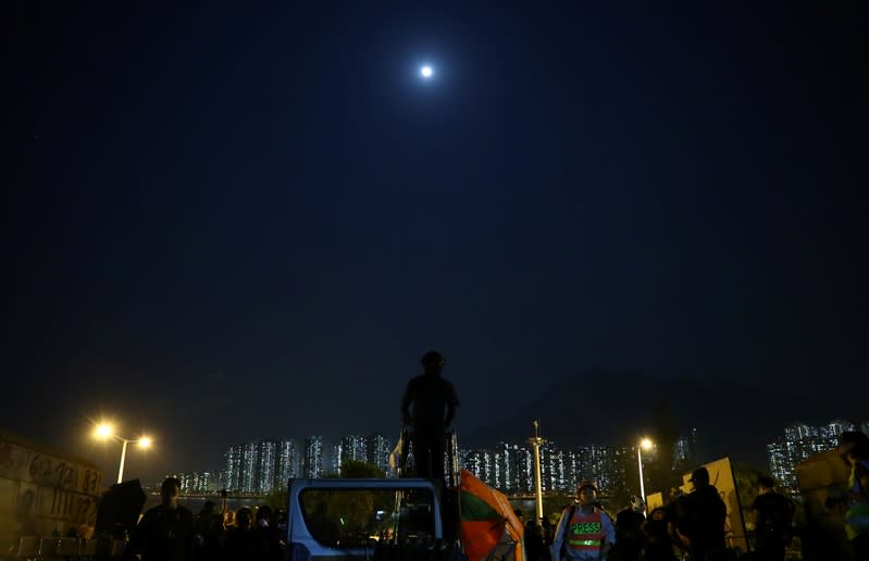 Protesters stand at a lookout at Chinese University in Hong Kong