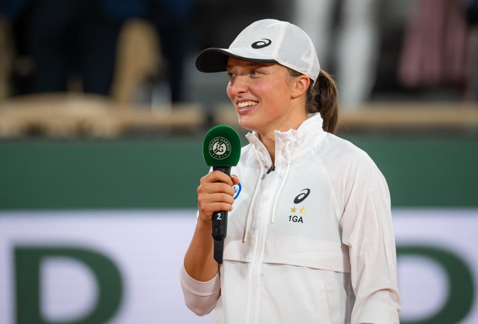 Iga Swiatek, pictured here delivering her victory speech after winning the French Open.