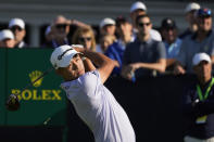 Collin Morikawa hits on the first hole during the first round of the U.S. Open golf tournament at The Country Club, Thursday, June 16, 2022, in Brookline, Mass. (AP Photo/Charles Krupa)