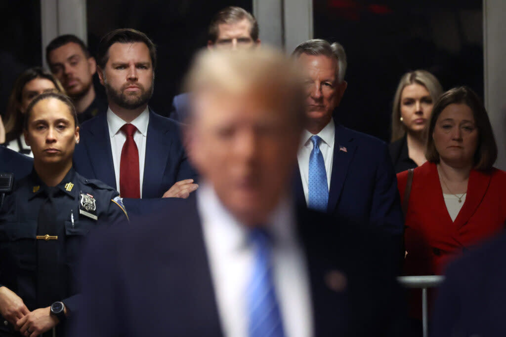 U.S. Sens. J.D. Vance, R-Ohio, and Tommy Tuberville, R-Ala., listen as former U.S. President Donald Trump speaks to the media outside Manhattan Criminal Court on May 13, 2024, during his trial for allegedly covering up hush money payments