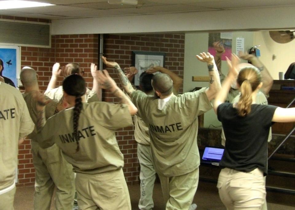 Inmates at the South Dakota Penitentiary perform in movement exercises as part of the I Believe/The South Dakota Prison Project.