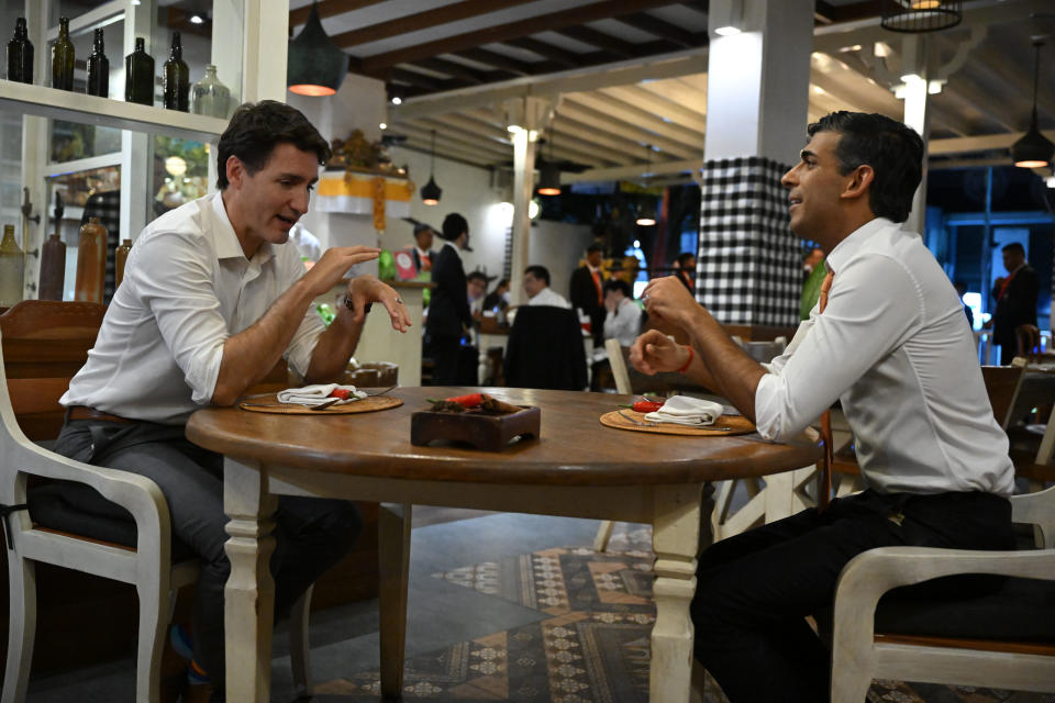 NUSA DUA, INDONESIA - NOVEMBER 14: Canada's Prime Minister Justin Trudeau and British Prime Minister Rishi Sunak have a bilateral meeting at the Art Cafe Bumbu Bali on November 14, 2022 in Nusa Dua, Indonesia. The new British Prime Minister aims to articulate his foreign policy vision here while grappling with economic instability at home. (Photo by Leon Neal/Getty Images)