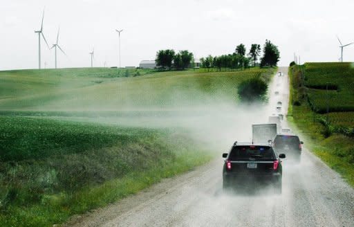 US President Barack Obama's motorcade arrives at the Heil Family Farm in Haverhill, Iowa, during his three-day campaign bus tour across the state. Obama, barnstorming across Iowa, another tightly contested battleground, sarcastically charged that Romney simply did not understand the heartland economy, as he attacked the Republican over wind power