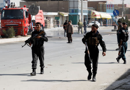 Afghan policemen keep watch at the site of a suicide attack in Kabul, Afghanistan October 29, 2018. REUTERS/Omar Sobhani