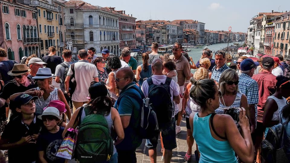 Previously, more than 100,000 people poured into Venice on some holidays, leading to scenes like this in 2017. - Stefano Mazzola/Awakening/Getty Images