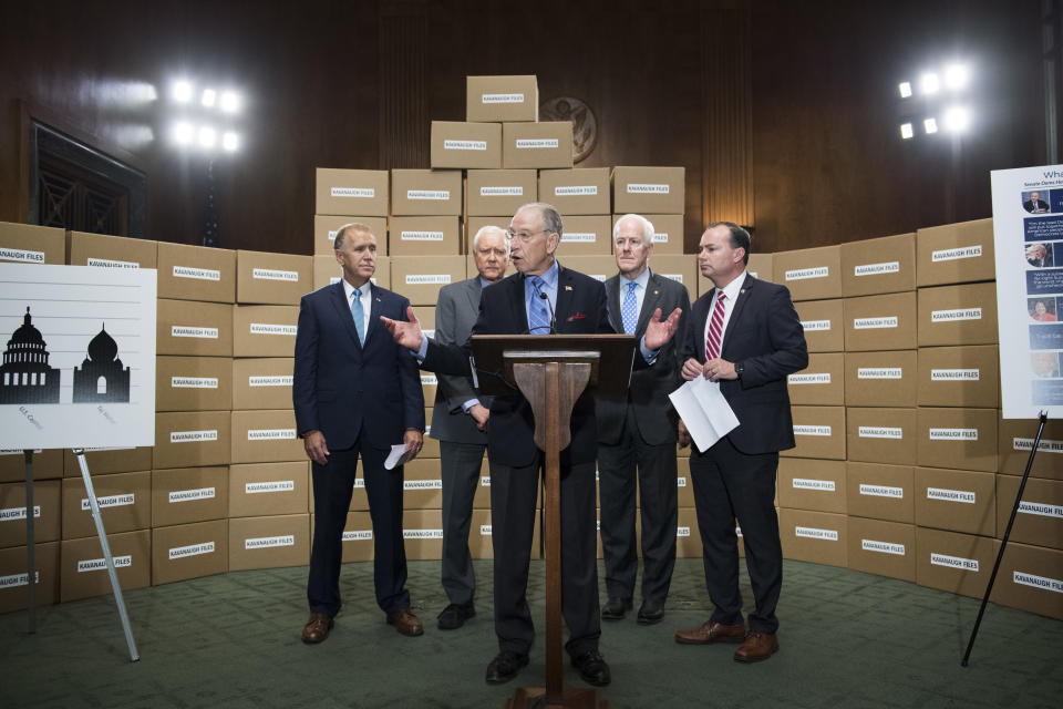 Republican Senate Judiciary Committee members standing with boxes representing roughly 1 million pages of documents on Supreme Court nominee Brett Kavanaugh. (Photo: Tom Williams via Getty Images)