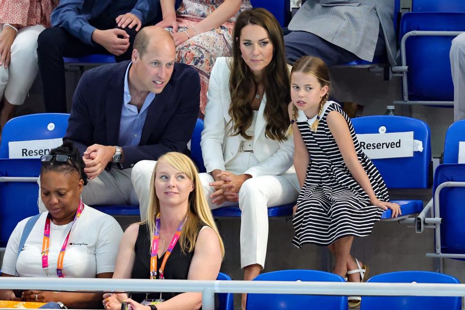 Prince William, Duke of Cambridge, Catherine, Duchess of Cambridge and Princess Charlotte of Cambridge attend the Sandwell Aquatics Centre during the 2022 Commonwealth Games