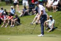 J.T. Poston putts on the ninth green during the final round of the John Deere Classic golf tournament, Sunday, July 3, 2022, at TPC Deere Run in Silvis, Ill. (AP Photo/Charlie Neibergall)