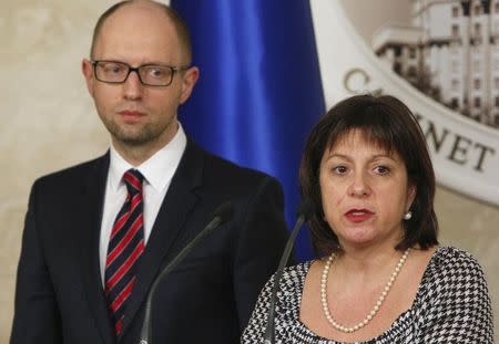 Ukraine's Finance Minister Natalia Yaresko and Prime Minister Arseny Yatseniuk address the media during a news briefing in Kiev March 11, 2015. REUTERS/Valentyn Ogirenko