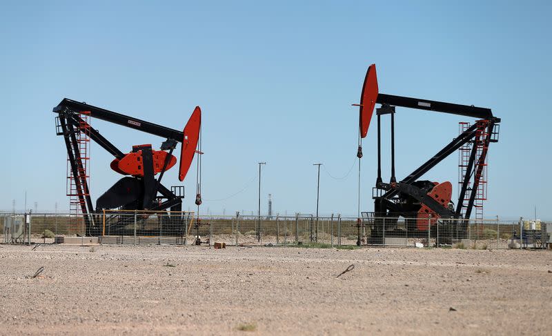 FILE PHOTO: Oil pump jacks are seen at Vaca Muerta shale oil and gas drilling, in the Patagonian province of Neuquen