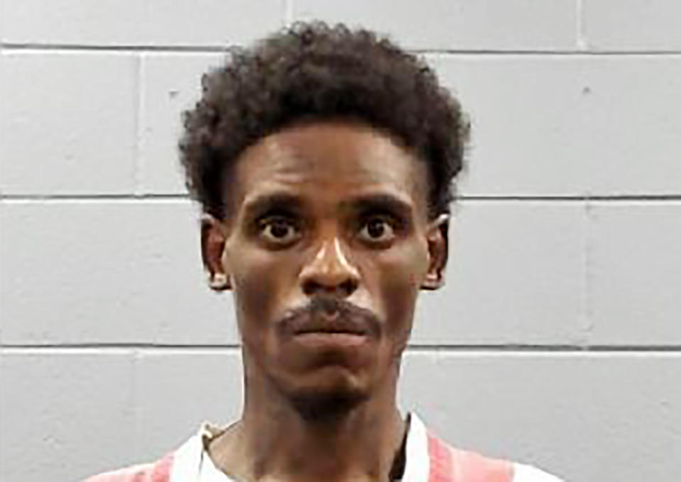 This photo provided by the Mississippi Department of Corrections shows John Travis Ross. Ross is one of two people arrested in connection with flying a drone carrying marijuana, cigarette lighters and other contraband over the Central Mississippi Correctional Facility, in Pearl, Miss., in an effort to smuggle the items to friends in the facility. (Mississippi Department of Corrections via AP)