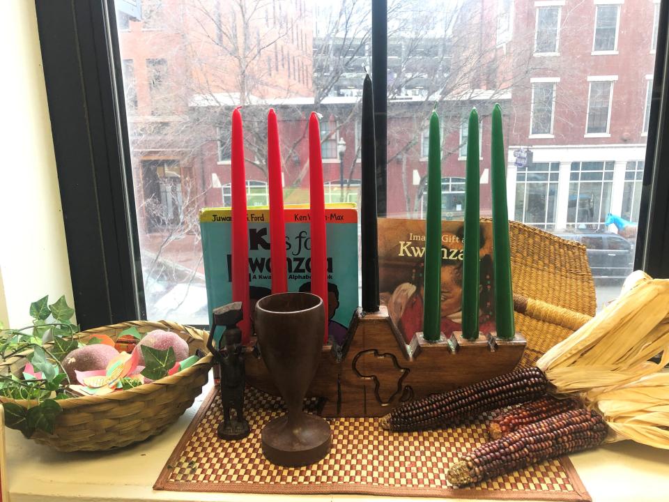 Local mother Kristen Williams' Kwanzaa candleholder represents the seven days of the holidays, which celebrates African American roots and heritage.