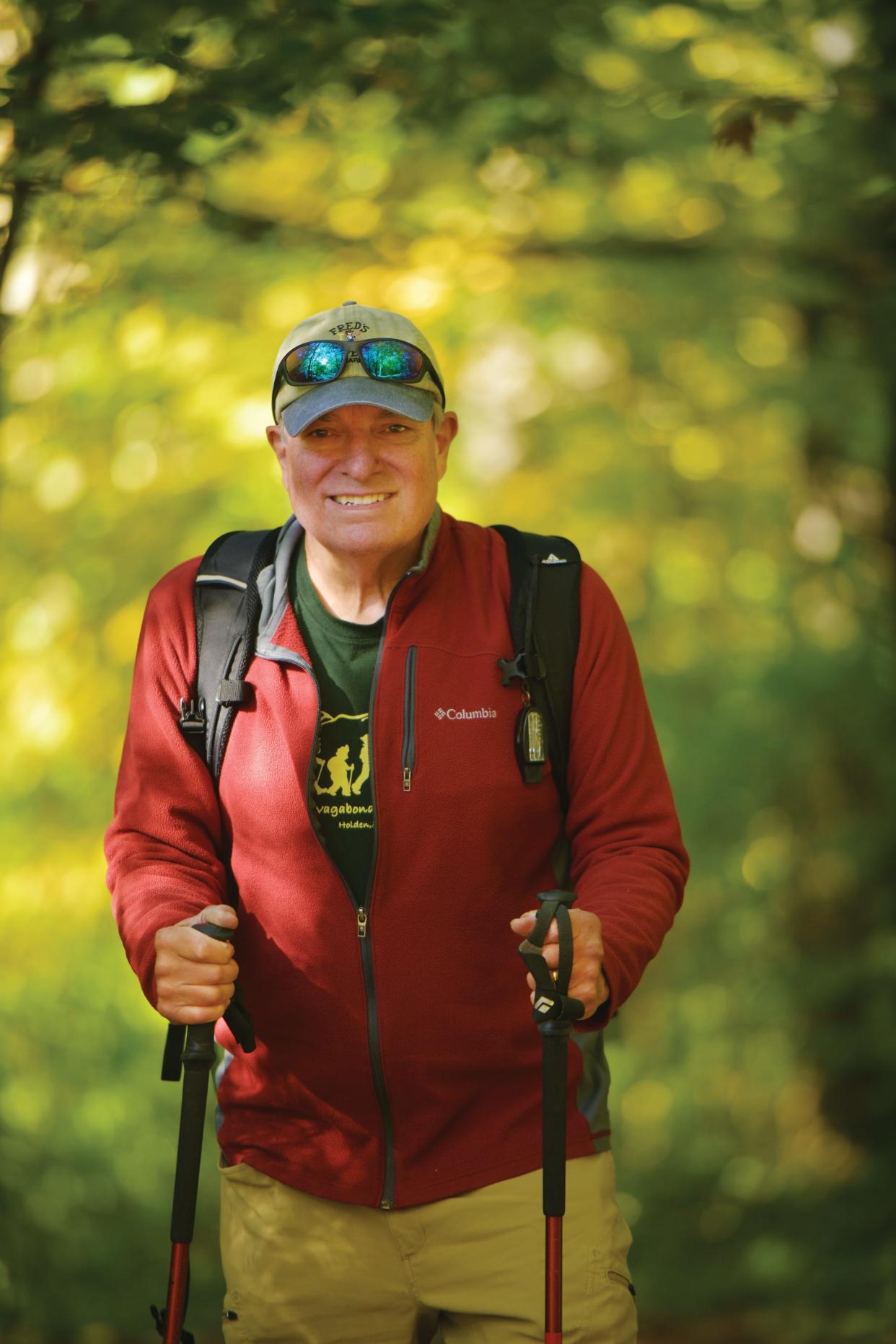Glenn Anderson, who heads a hiking group of retirees called The Vintage Vagabonds, leads a hike in Petersham, Mass., at the Trustees' Brooks Woodland Reservation in September.