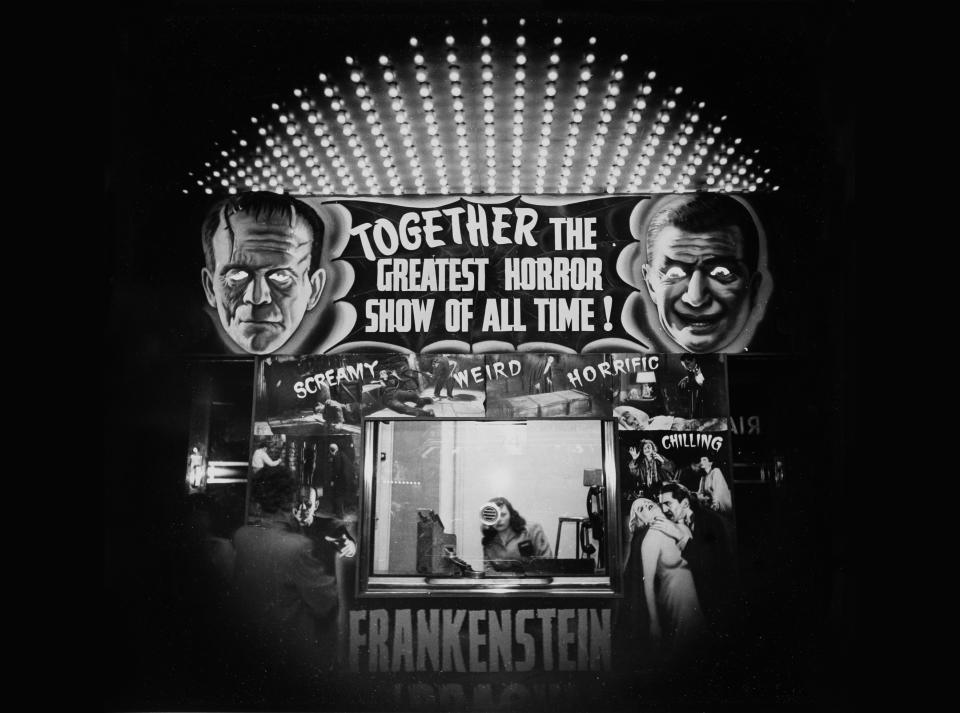 A theater ticket booth advertises Frankenstein and Dracula in 'The Greatest Horror Show of All Time', 1940. (Photo by Weegee(Arthur Fellig)/International Center of Photography/Getty Images)