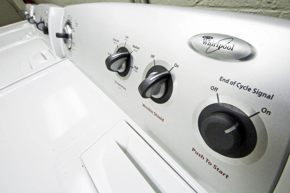 FILE- This Jan. 19, 2012, file photo shows whirlpool dryers in an apartment building laundry in Pittsburgh. The Whirlpool Corporation reports financial results Monday, Jan. 28, 2019. (AP Photo/Gene J. Puskar, File)