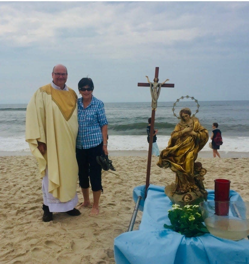 Bishop Richard Henning with his mother at a Blessing of the Waters service on Ocean Beach in Long Island, New York. His longtime friend Maggie Killeen describes him as a doting son.
