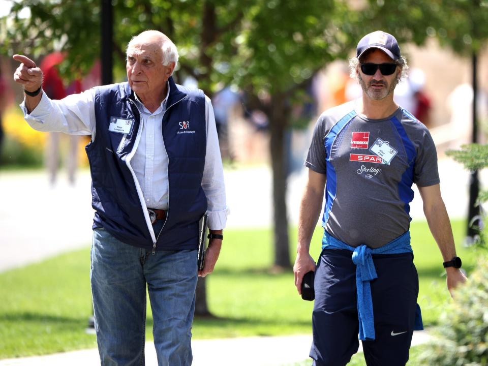 Ken Langone and Alex Karp walking outside at Sun Valley