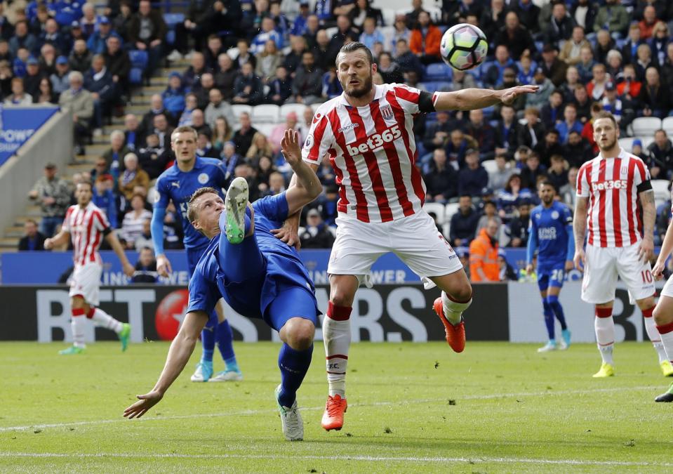 <p>Stoke City’s Erik Pieters in action with Leicester City’s Robert Huth </p>